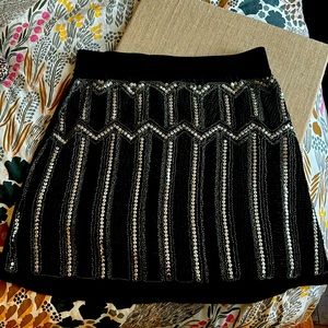 New never worn. Sequin and beaded mini skirt
